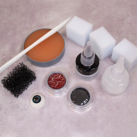 grimas-derma-wax-realistische-special-effects-wax Dermawax spatula, Artificial eye 301, disposable make-up sponges, dermawax 60ml, multi remover 25ml, stoppelsponge, Filmblood D 25ml, water make-up pure 101 &504, R4 Brush